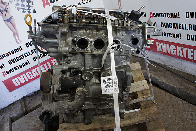 Двигатель вид с боку Toyota 1KR-FE